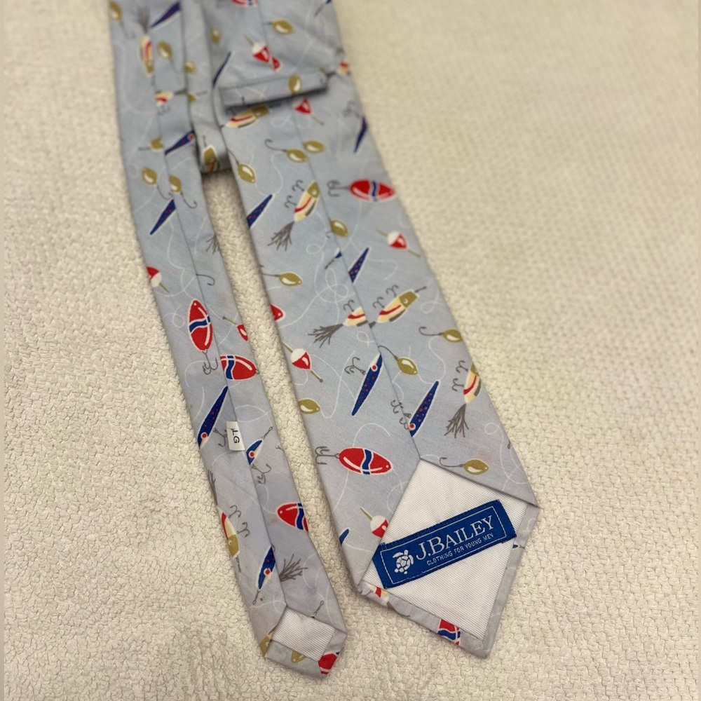 Boys tie fishing motif.